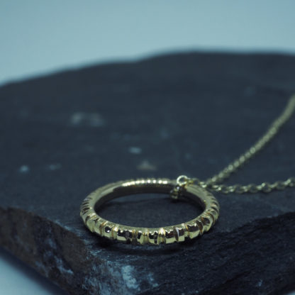 Stunning 9k gold pendant with handmade engraved detail